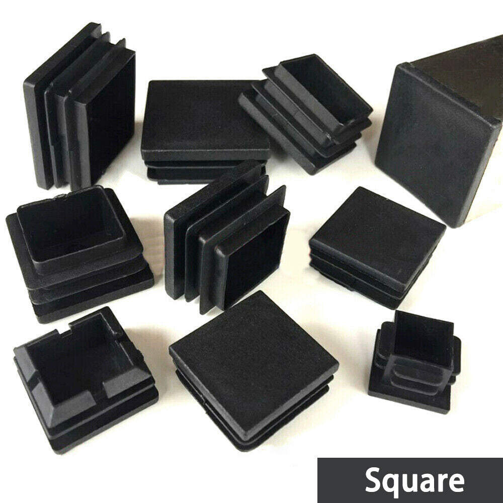 Close-up of black square/rectangle plastic end caps for pipe/tube sealing, durable blanking plugs