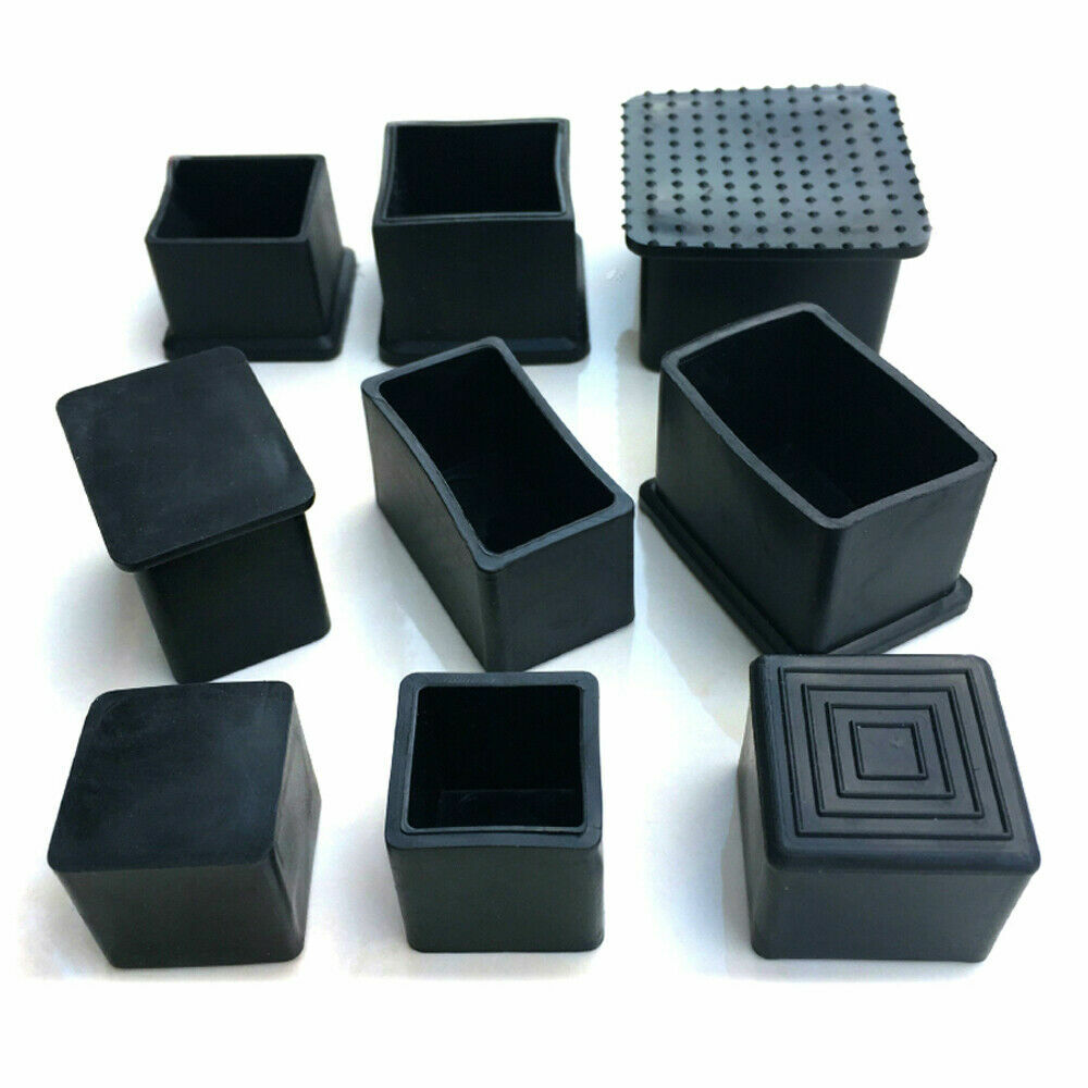 PVC rubber caps protecting rectangular tubing ends on industrial equipment