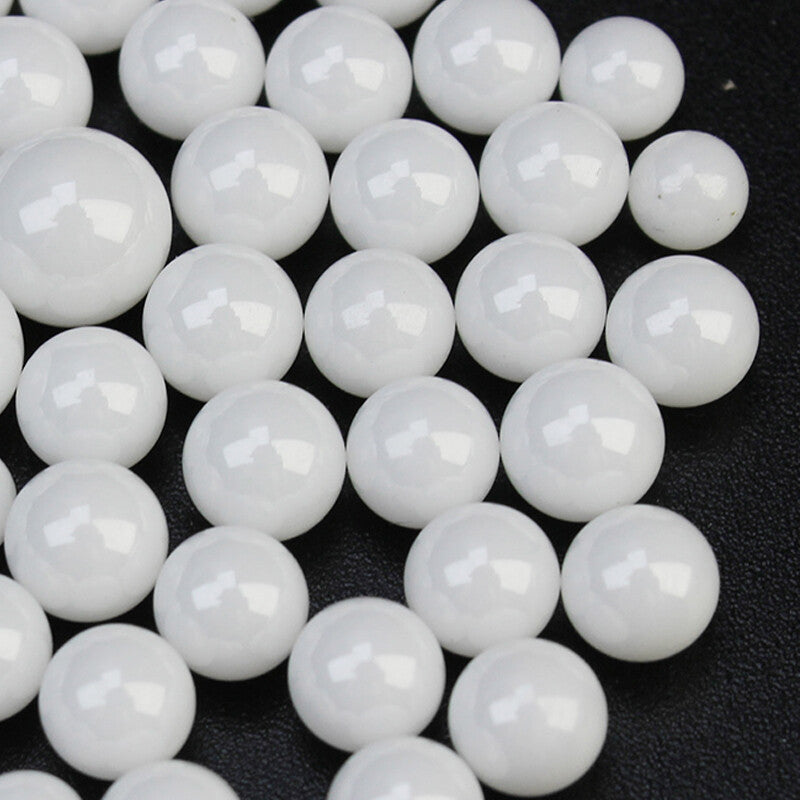 Extreme close-up of polished 10mm ZrO2 ball showing mirror-like surface finish