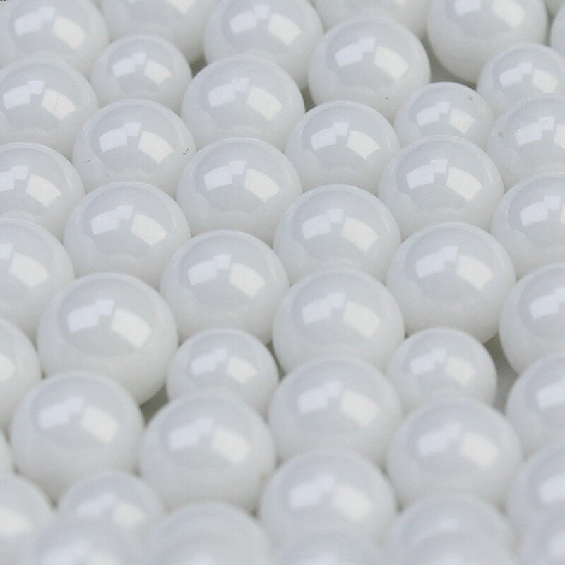 Macro comparison showing size progression from smallest to largest balls