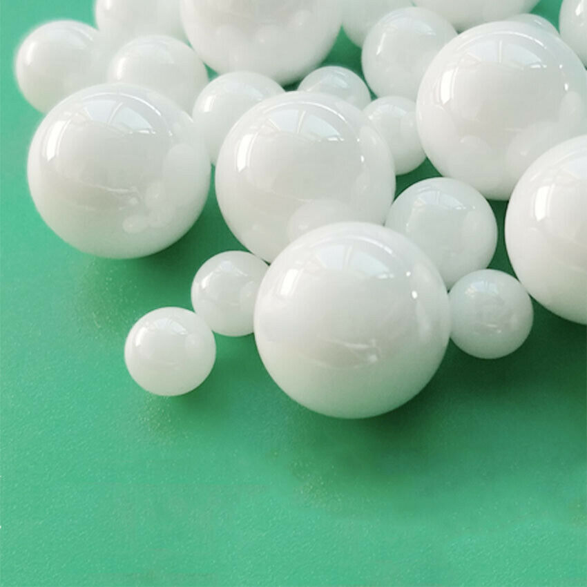 Close-up macro shot of zirconia ceramic balls showing smooth surface finish