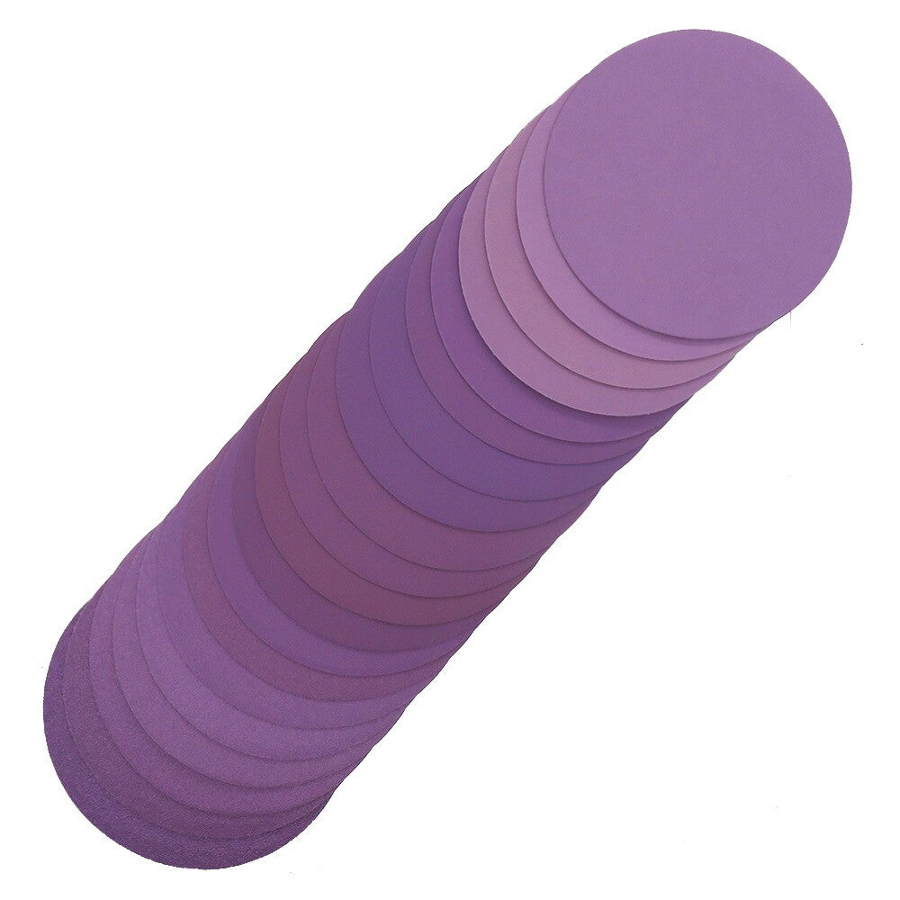 Stack of 6-inch 150mm purple wet and dry sanding discs for orbital sanders.