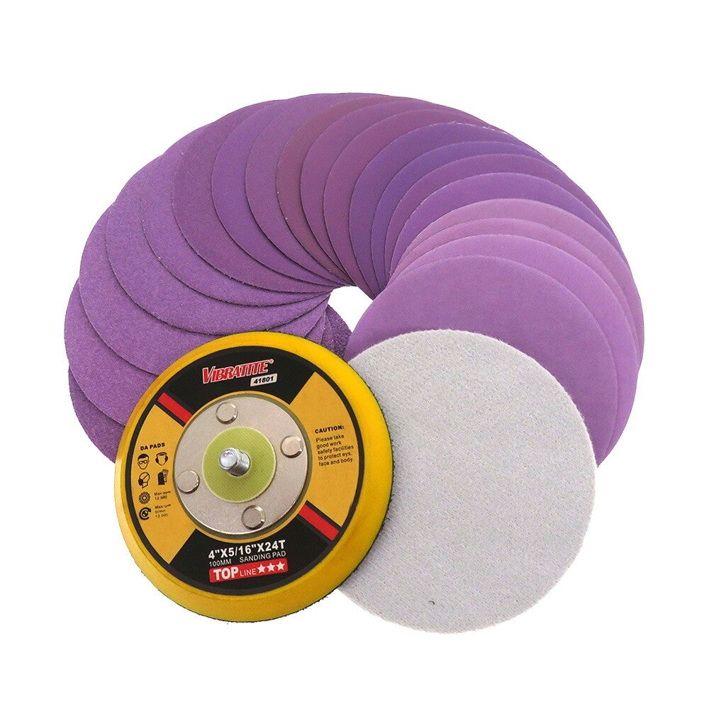 Side-angle view of a 4-inch purple sanding disc, highlighting its low profile and backing pad attachment.