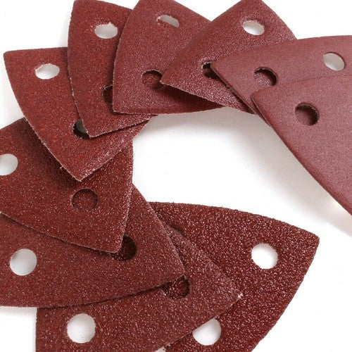 Assorted grit triangular sanding pads for home improvement and woodworking tasks.