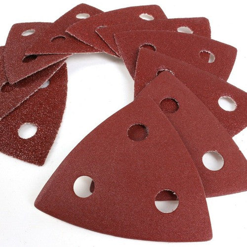 Close-up of triangular delta sanding sheets with hook and loop backing, ideal for detail sanding in DIY projects.