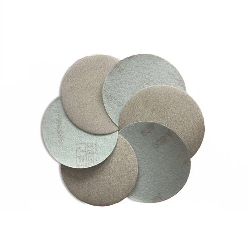 Close-up of a single 75mm (3-inch) hook and loop sanding disc with a coarse P60 grit surface.