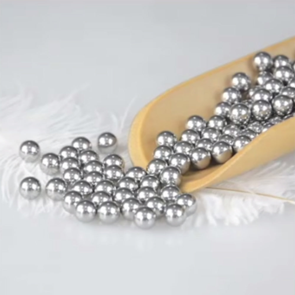 Macro detail of the carbon steel ball surface showing its machinable quality