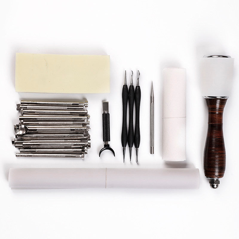 Leather Carving Tool Set – 20 Stamps + Swivel Knife + Hammer + Sponge & Transfer Paper
