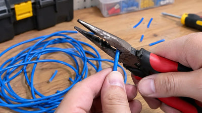 Needle-nose pliers on a workbench — HomeDIYer