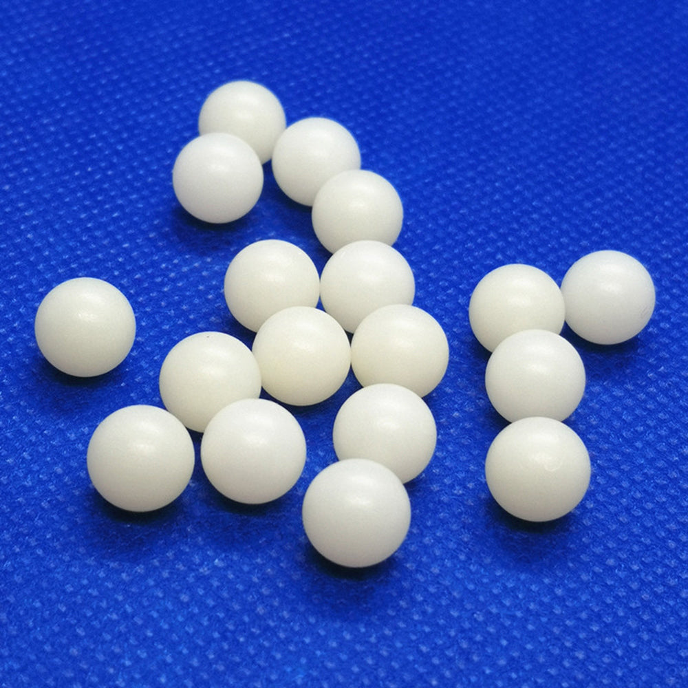 White PTFE seal balls showing durable construction, suitable for valve & pump systems