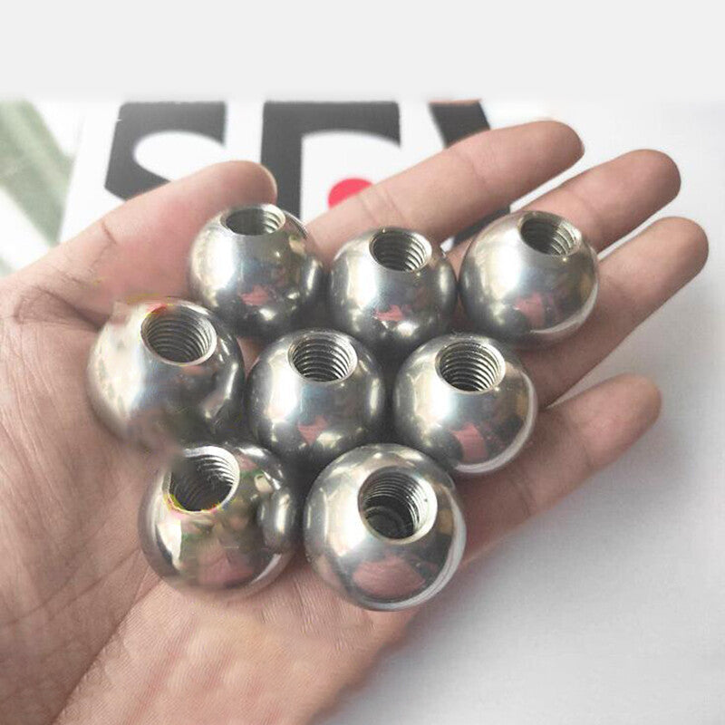 Selection of M2 and M2.5 thread ball bearings with round balls for size comparison.
