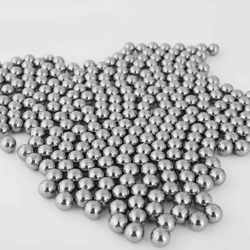 Side-by-side comparison with lower-grade steel balls highlighting finish difference