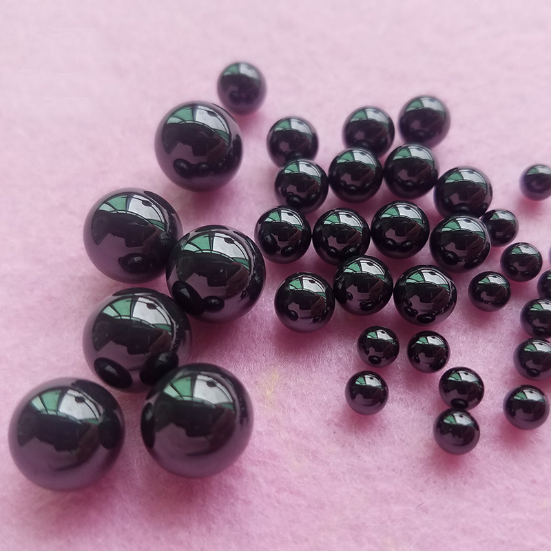 Quality control measurement of a Φ3mm Si3N4 ceramic bearing ball using a micrometer, demonstrating the high precision and consistent diameter of G5 grade balls.