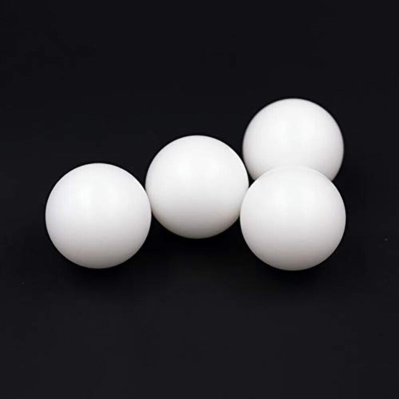 Polyoxymethylene plastic balls arranged to show size variety (2~50.8mm)