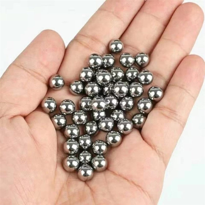 Macro detail of the smooth, polished surface on a 1/2 inch chrome steel ball