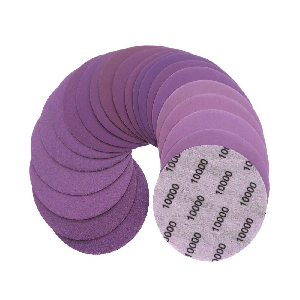 Full product lineup of 4-inch purple sandpaper discs from 60 to 10000 grit, organized by coarseness.