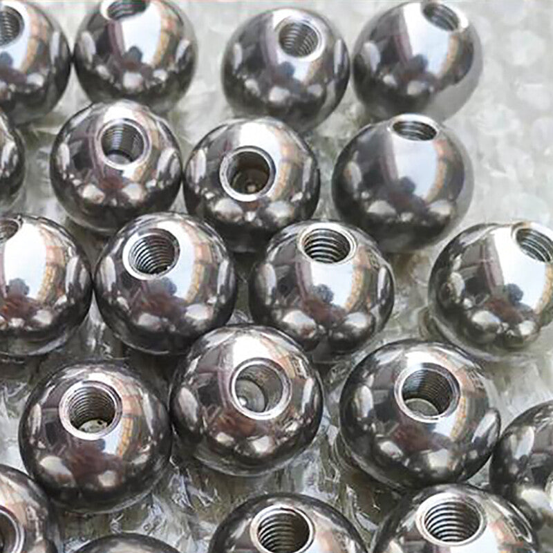 Detailed shot of the half-hole design and precision threads on the ball bearing.