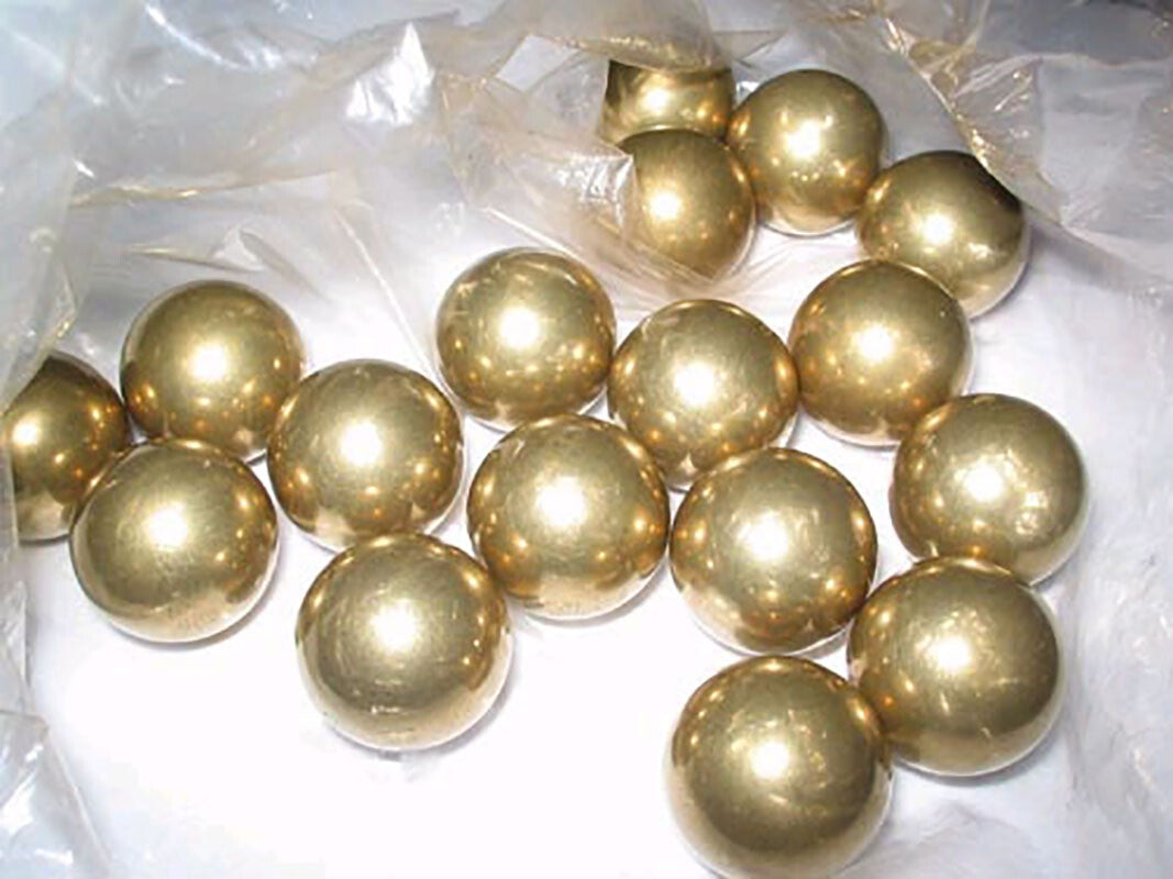 Macro detail of the precision machining on a small 5mm brass ball
