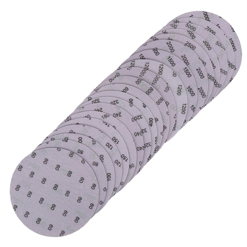 Purple sanding discs with a grit size indicator, ranging from 60 to 10000.