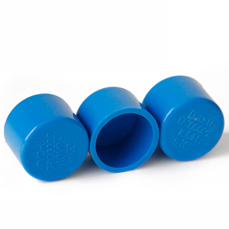 Close-up detail of blue PVC cap showing adhesive seal and clean edges