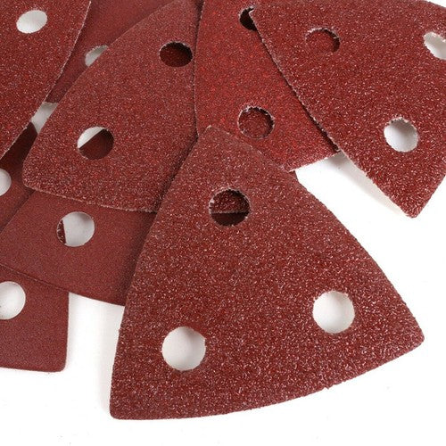 Triangular detail sandpaper pads in multiple colors, perfect for reaching tight corners.