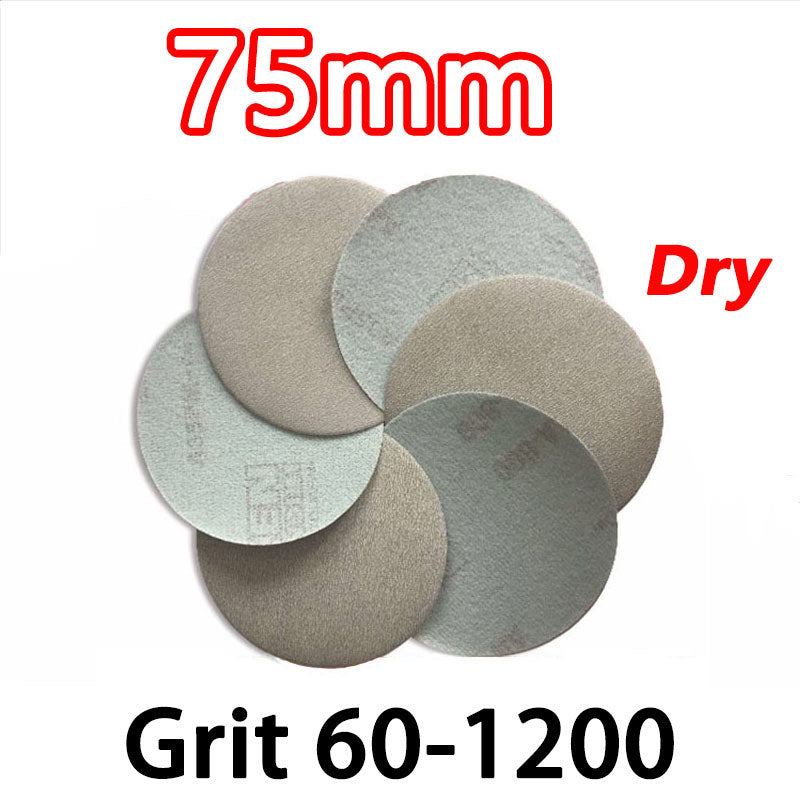 Close-up of a single 75mm (3-inch) hook and loop sanding disc with a coarse P60 grit surface.