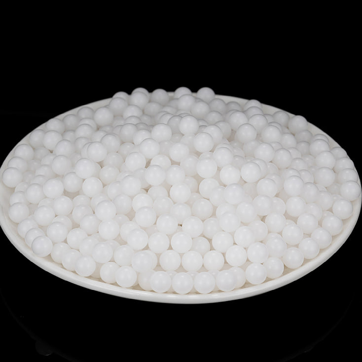 Assortment of large translucent PP plastic balls showing size range from 6mm to 50mm