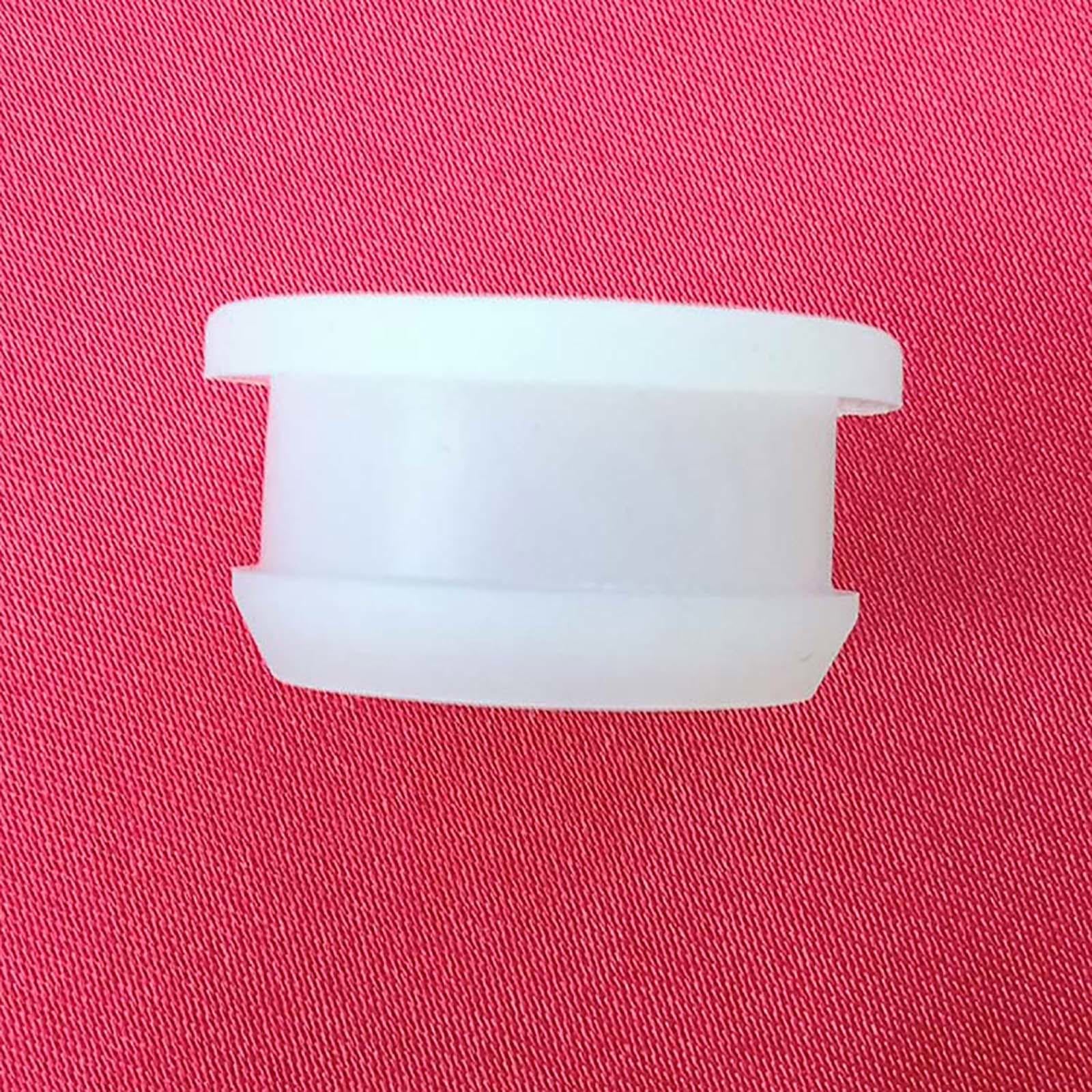 Close-up of silicone seal insert plug showing flexible transparent material