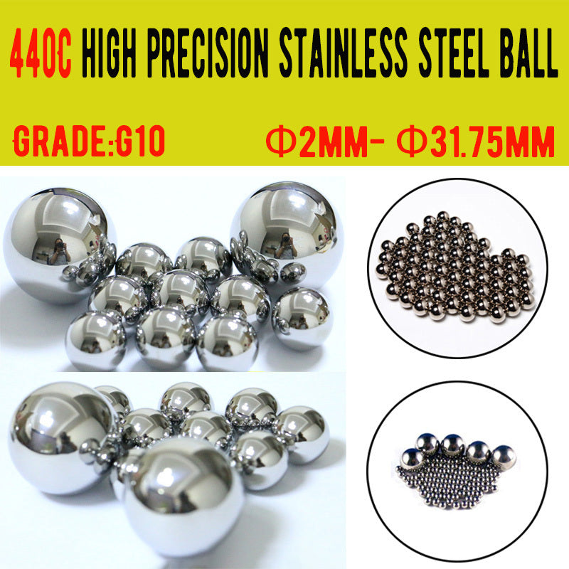 Assortment of 440C stainless steel bearing balls from 2mm to 31.75mm in a container