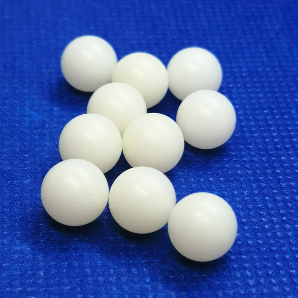 Assorted size white PTFE spheres (3-63mm) for industrial diaphragm pump seals