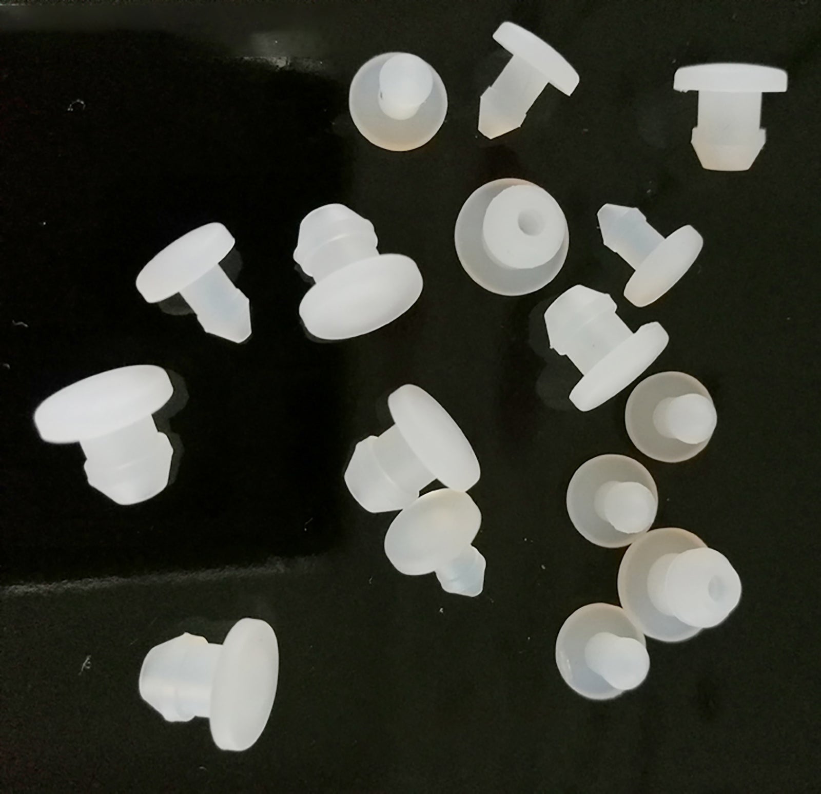 Flexibility test showing transparent silicone plug bending without cracking