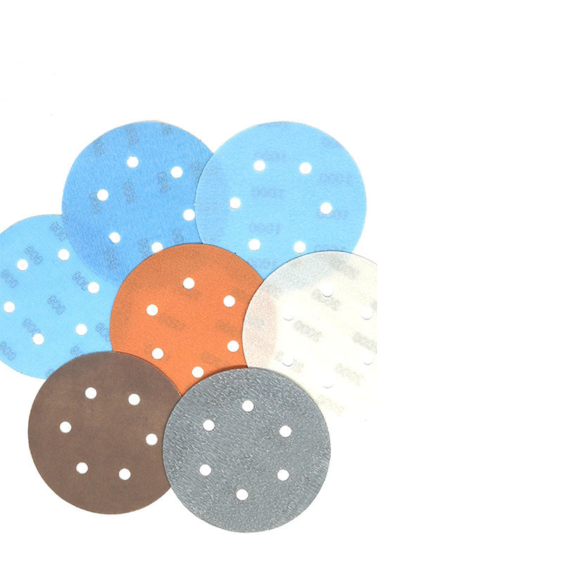 Single 6-hole 150-grit sanding disc showing abrasive surface and hook and loop pad design.