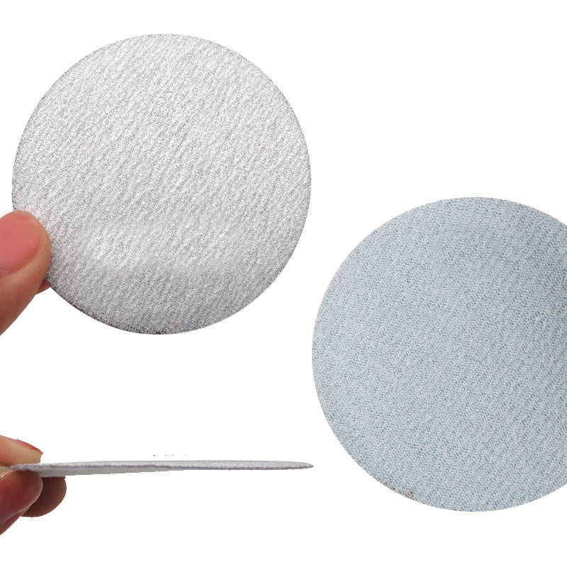 Stack of Multi-Grit 75mm Round Sandpaper Pads for All Sanding Stages | HomeDIYer